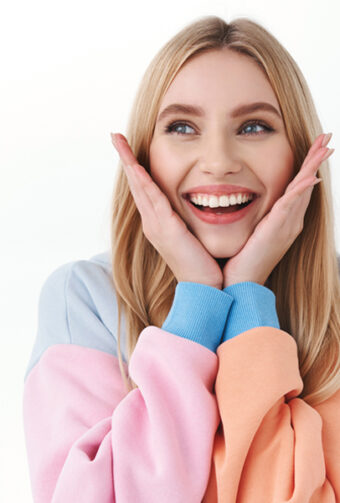 Smiling girl with bright white teeth.